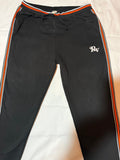 RV Black Track Pants with Orange Stripe Detail