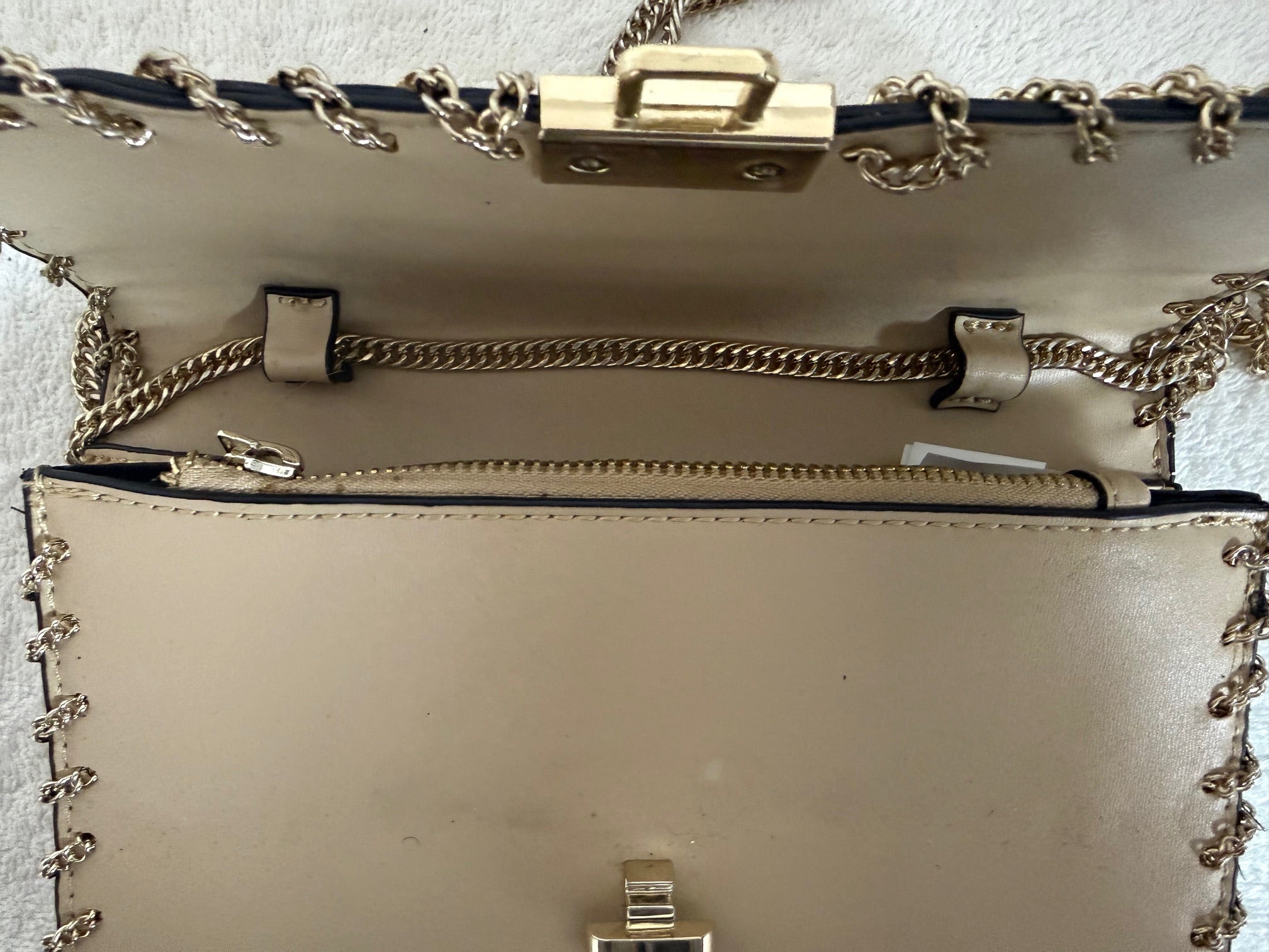 Beige Leather Clutch Bag with Gold Chain Trim