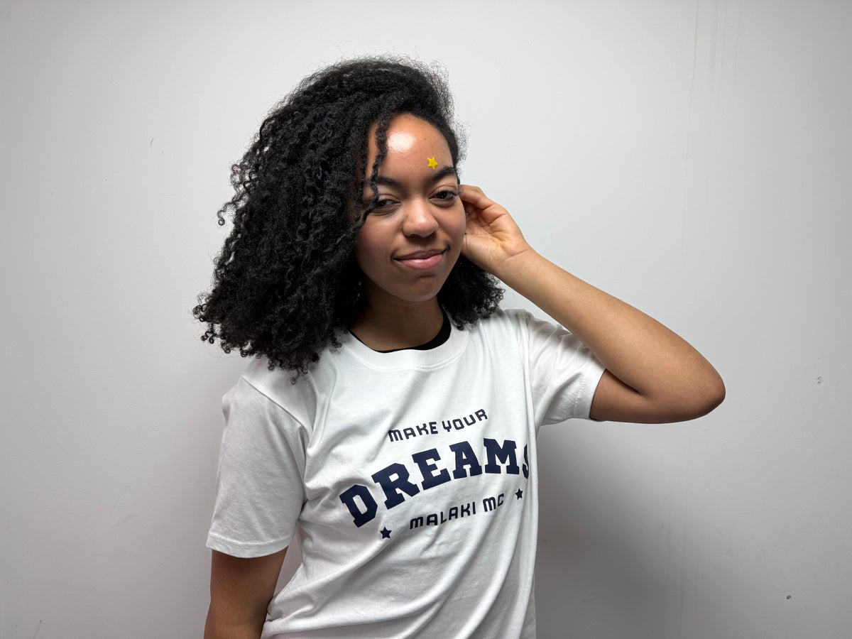 Malaki MC Make Your Dreams White T-Shirt - holding logo