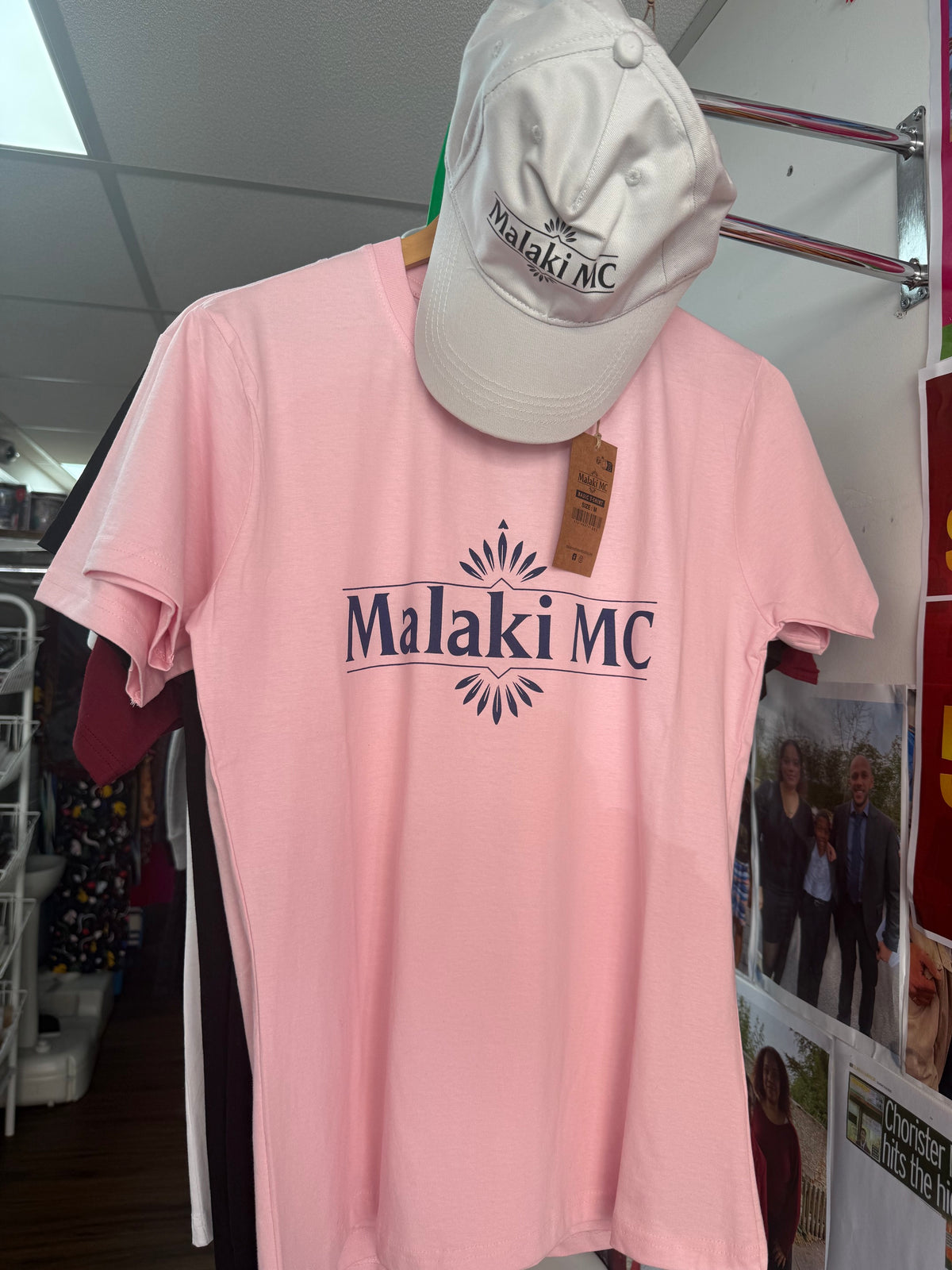 Malaki MC Pink Men's T-Shirt worn by young model next to burgundy logo tee