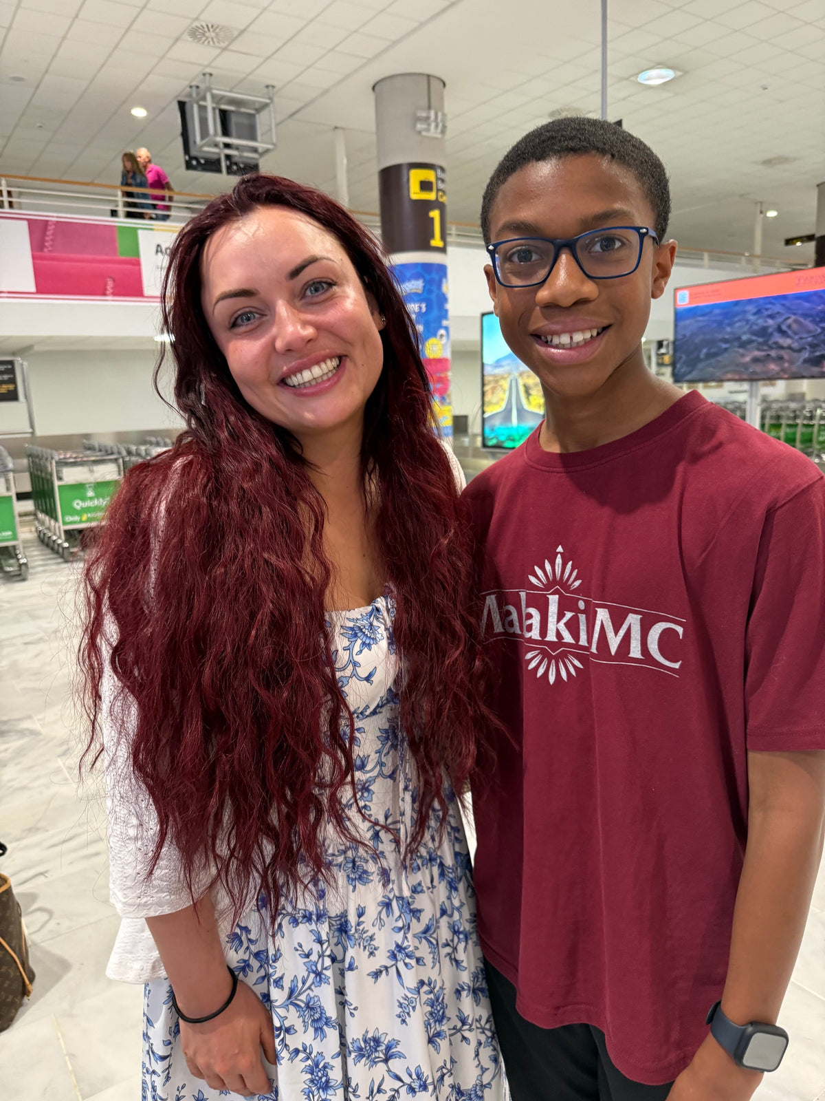 Malaki with Whitney Dean from EastEnders both wearing Malaki MC at the airport