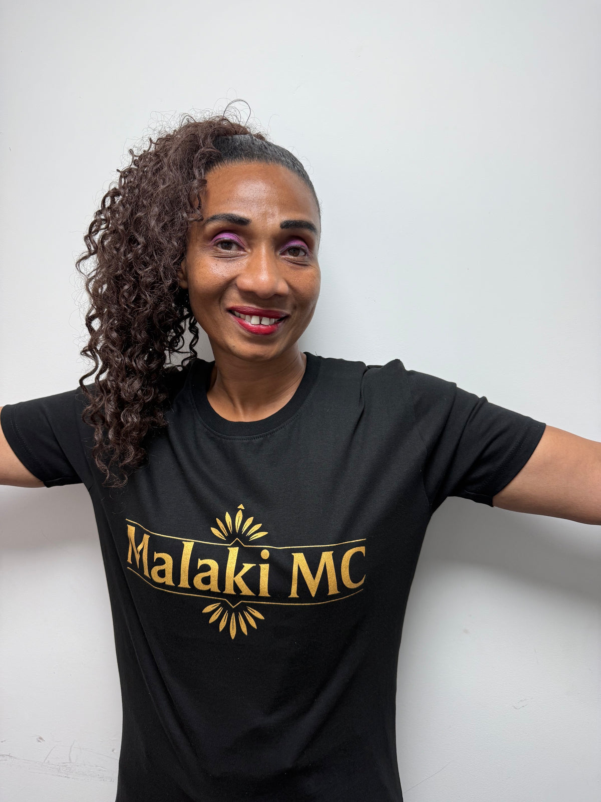 Malaki MC Women's Black T-Shirt - Front hands on hips pose
