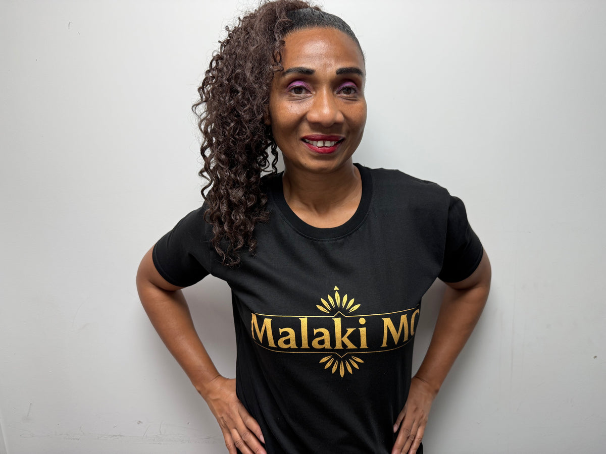 Malaki MC Women's Black T-Shirt - Hand in hair dynamic pose