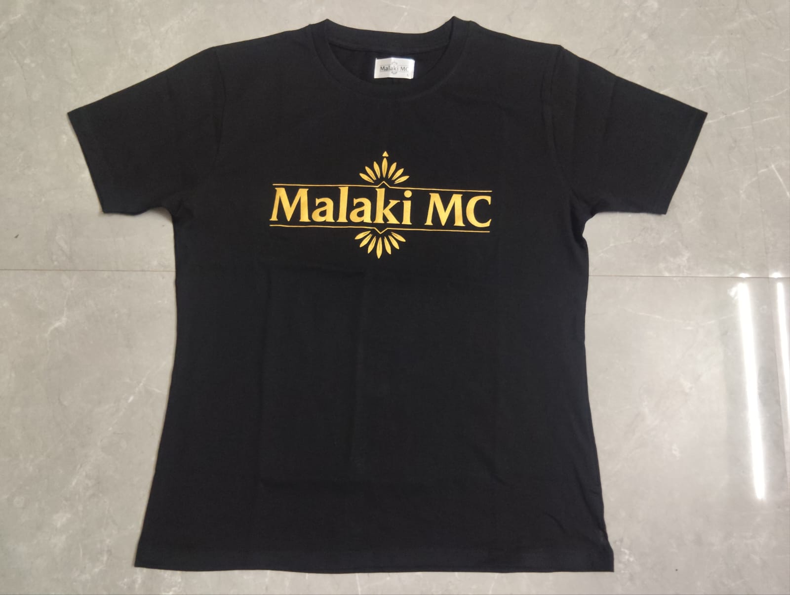 Malaki MC Women's Black T-Shirt - Gold Logo Branded Tee